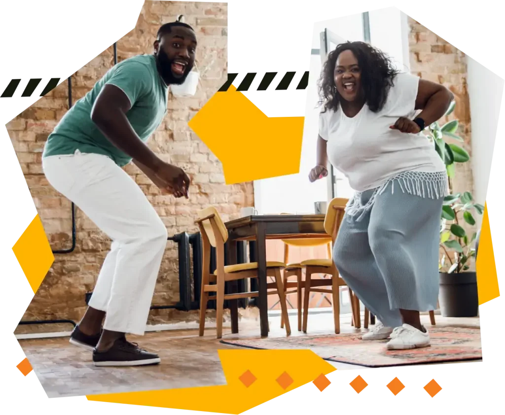 Two people from African Caribbean communities dancing, being active and happy. HEAL-D